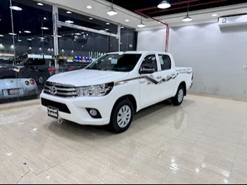 Toyota  Hilux  2024  Automatic  12,000 Km  4 Cylinder  Four Wheel Drive (4WD)  Pick Up  White  With Warranty