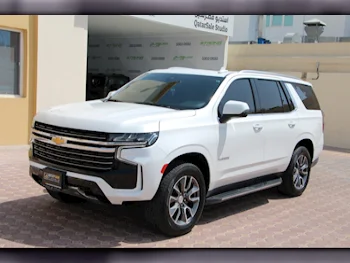 Chevrolet  Tahoe  LT  2021  Automatic  90,600 Km  8 Cylinder  Four Wheel Drive (4WD)  SUV  White  With Warranty