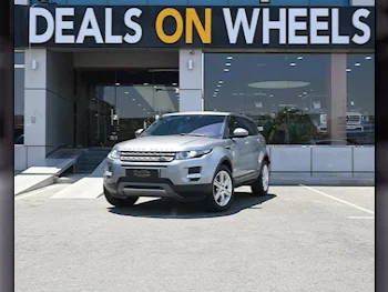 Land Rover  Evoque  2014  Automatic  44,000 Km  4 Cylinder  Four Wheel Drive (4WD)  SUV  Red and Gray