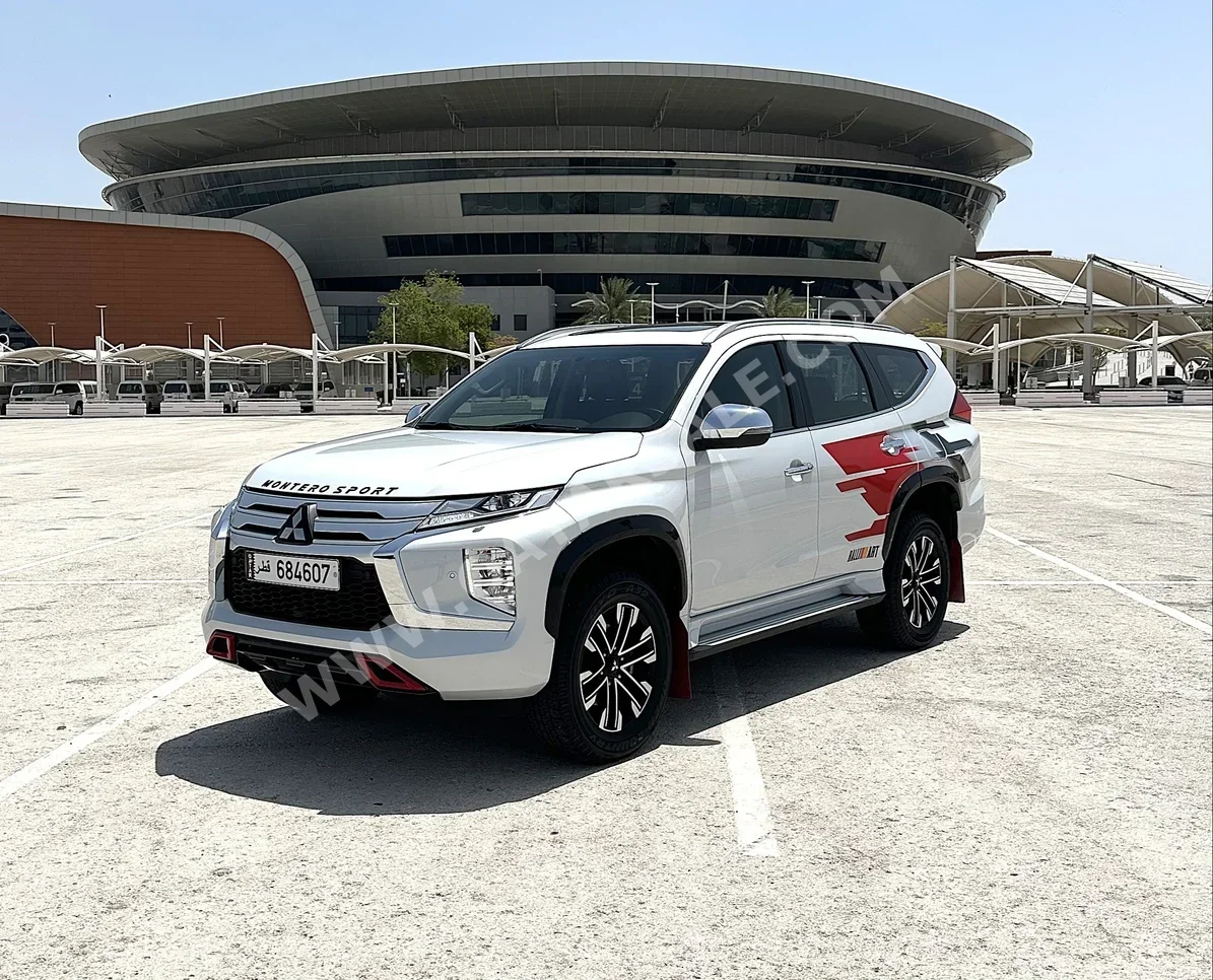 Mitsubishi  Pajero  Montero Sport  2023  Automatic  9,394 Km  6 Cylinder  All Wheel Drive (AWD)  SUV  White  With Warranty