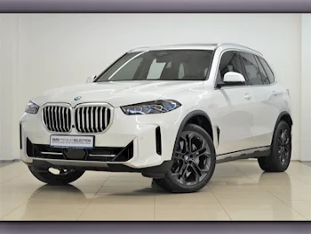 BMW  X-Series  X5 40i  2024  Automatic  13,700 Km  6 Cylinder  All Wheel Drive (AWD)  SUV  White  With Warranty