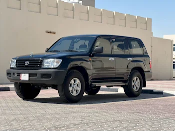 Toyota  Land Cruiser  G  2001  Manual  285,000 Km  6 Cylinder  Four Wheel Drive (4WD)  SUV  Black