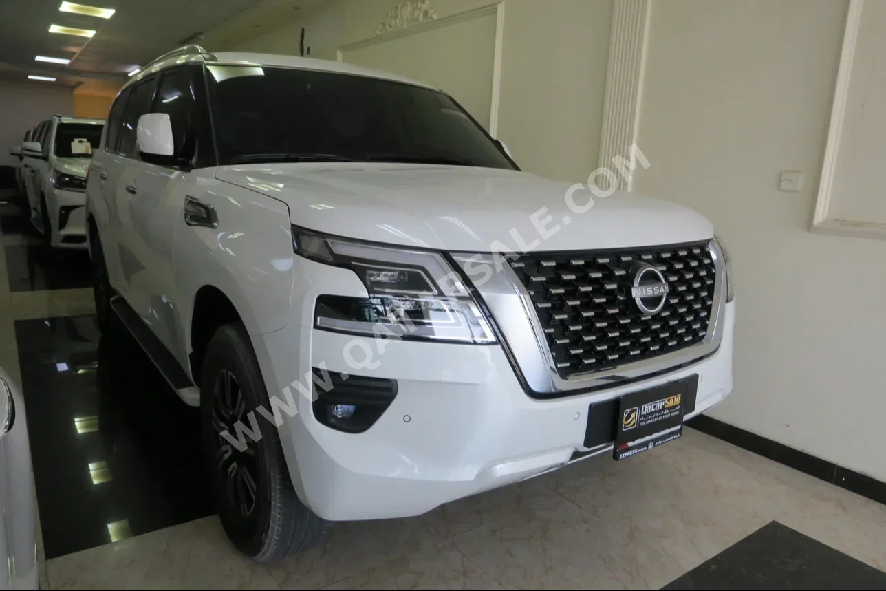  Nissan  Patrol  SE  2024  Automatic  3,000 Km  6 Cylinder  Four Wheel Drive (4WD)  SUV  White  With Warranty