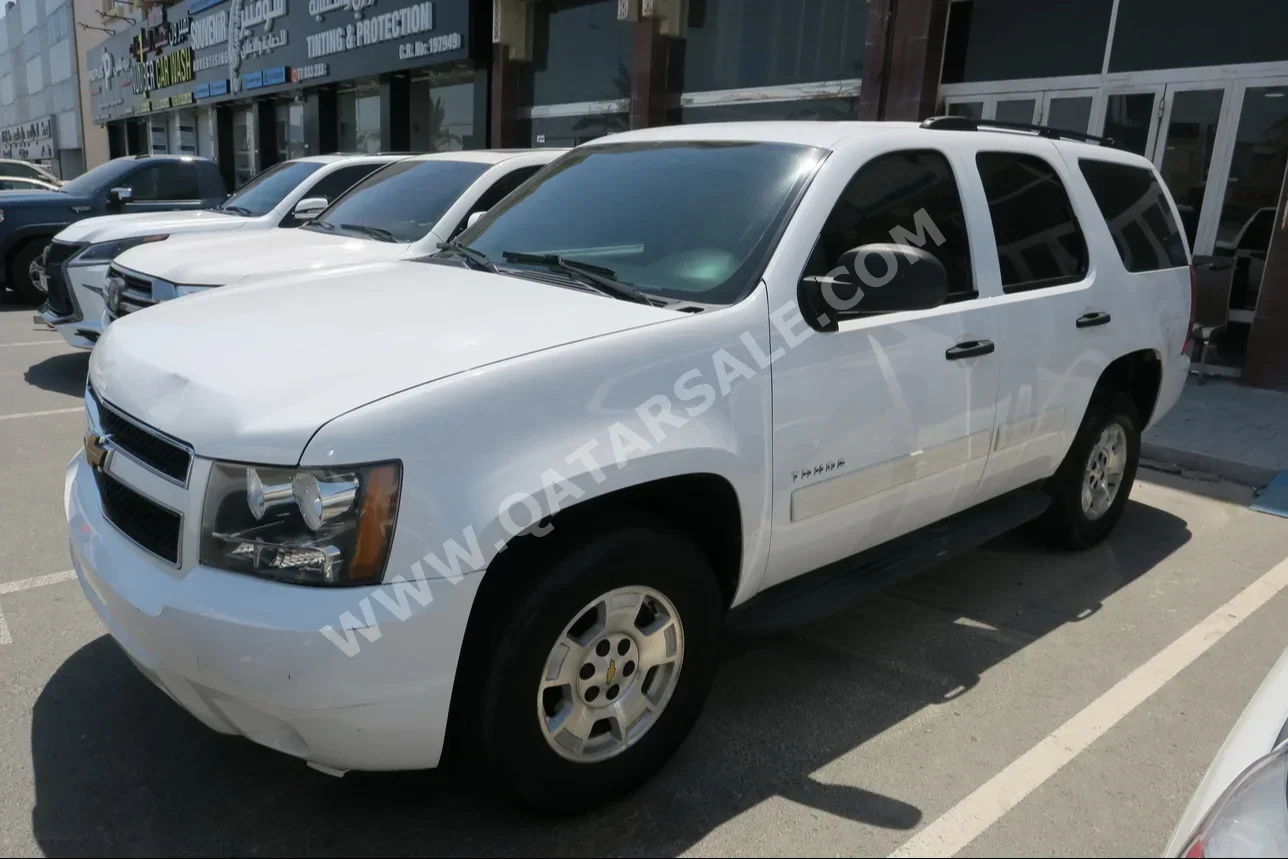 Chevrolet  Tahoe  2012  Automatic  233,000 Km  8 Cylinder  Four Wheel Drive (4WD)  SUV  White