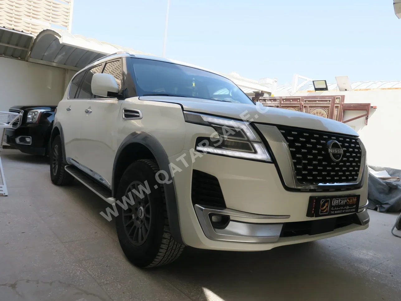 Nissan  Patrol  XE  2016  Manual  75,000 Km  8 Cylinder  Four Wheel Drive (4WD)  SUV  White