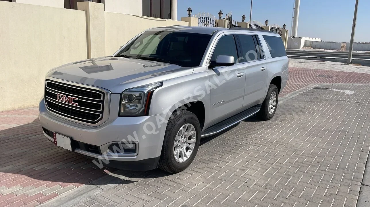 GMC  Yukon  XL  2018  Automatic  119,320 Km  8 Cylinder  Four Wheel Drive (4WD)  SUV  Silver