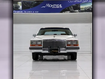 Cadillac  Brougham  1988  Automatic  80,000 Km  8 Cylinder  Front Wheel Drive (FWD)  Sedan  White