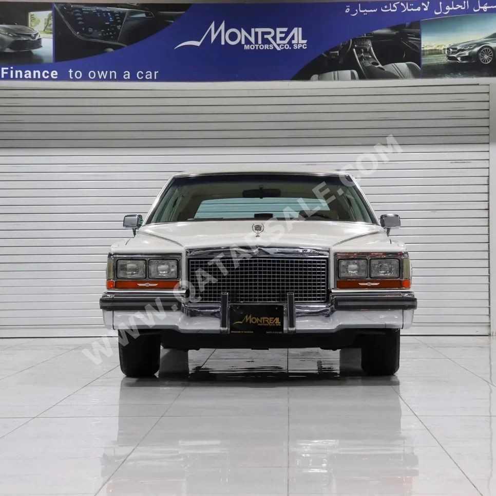 Cadillac  Brougham  1988  Automatic  80,000 Km  8 Cylinder  Front Wheel Drive (FWD)  Sedan  White