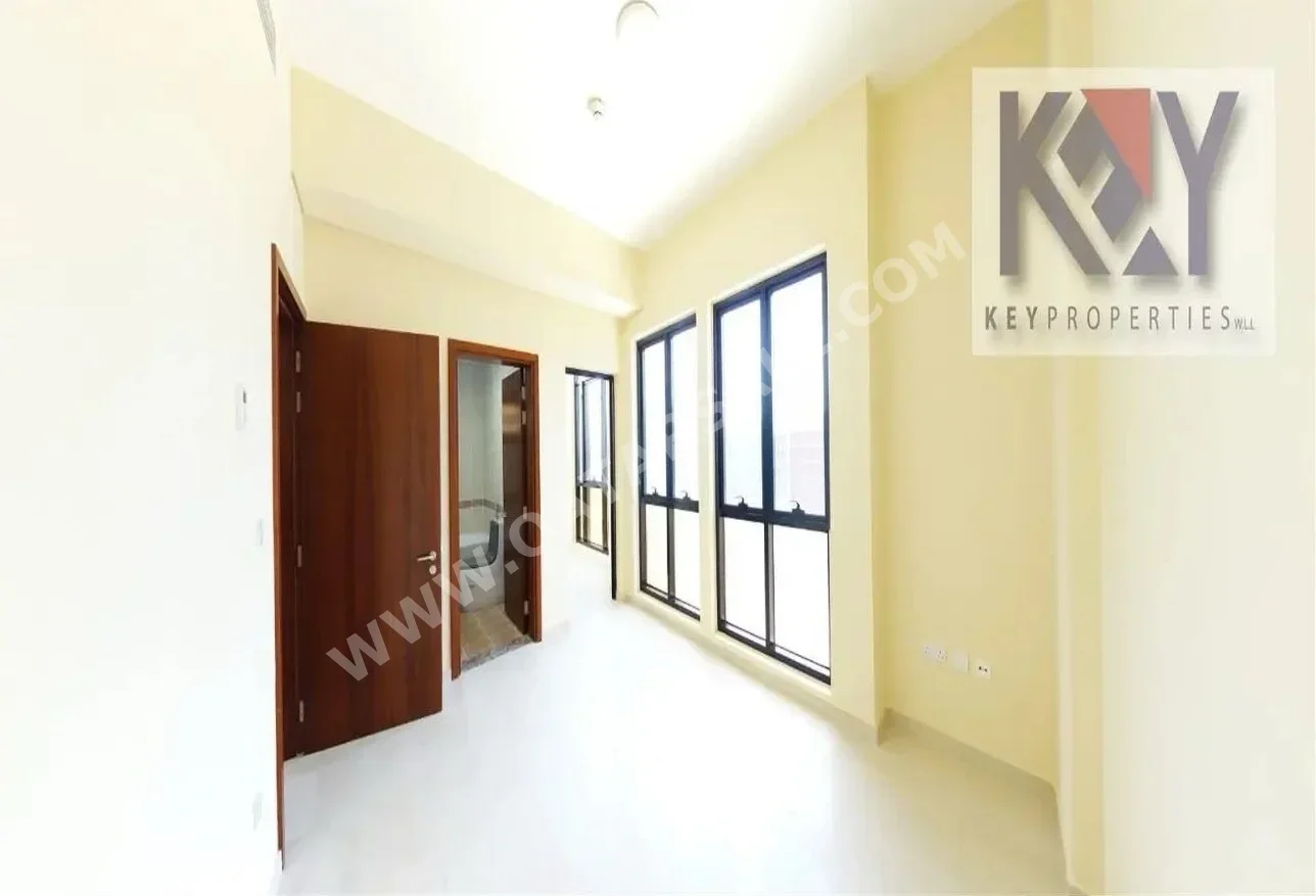 2 Bedrooms  Apartment  For Rent  in Doha -  Rawdat Al Khail  Semi Furnished