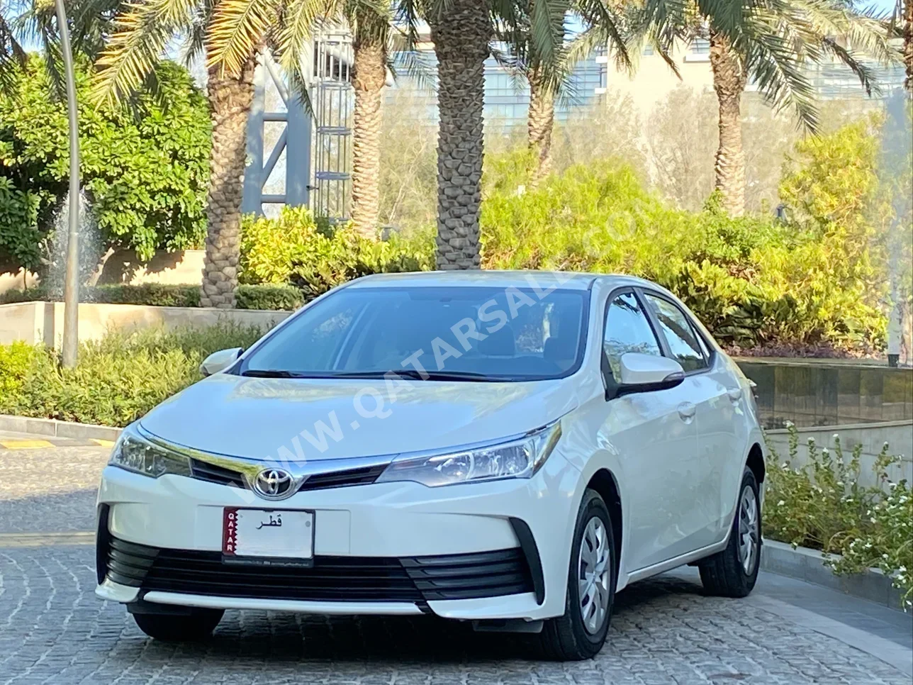 Toyota  Corolla  XLI  2019  Automatic  117,000 Km  4 Cylinder  Front Wheel Drive (FWD)  Sedan  White