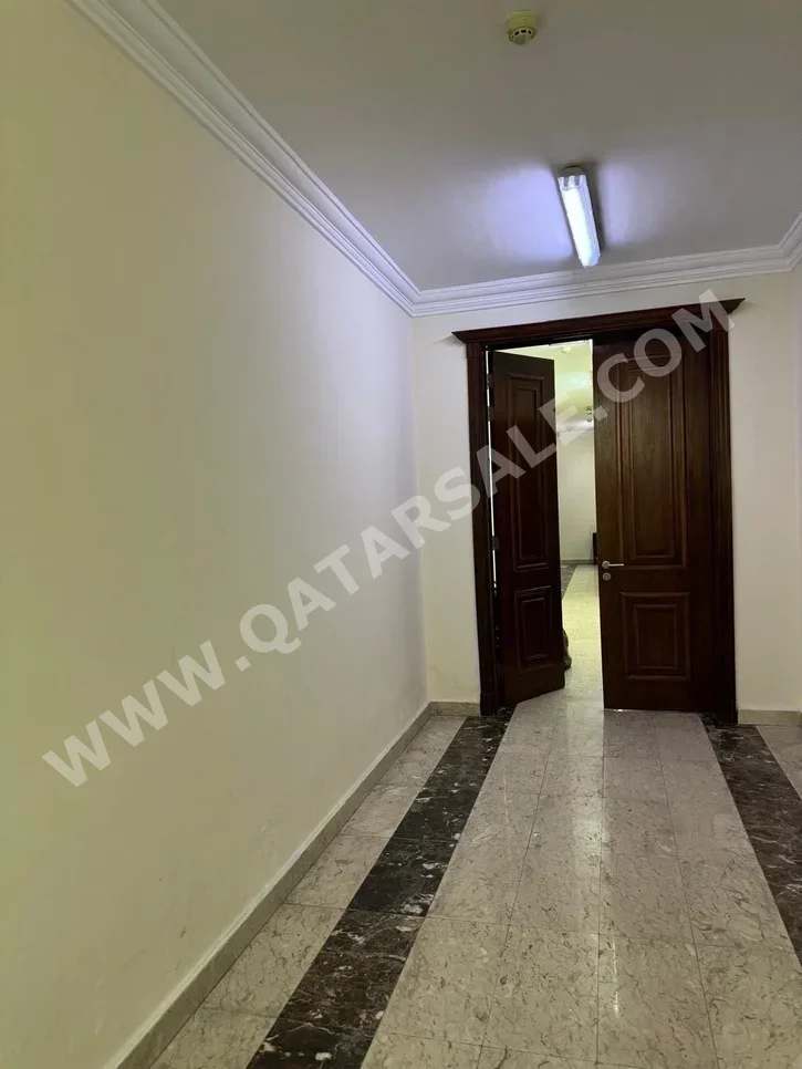 2 Bedrooms  Apartment  For Rent  in Umm Salal -  Umm Salal Ali  Not Furnished