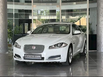 Jaguar  XF  2015  Automatic  70,000 Km  4 Cylinder  Rear Wheel Drive (RWD)  Sedan  White