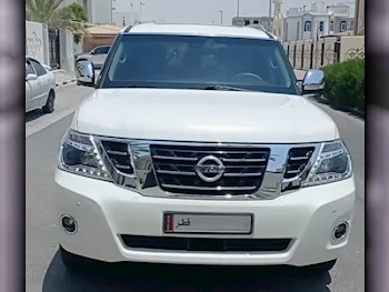 Nissan  Patrol  2012  Automatic  207,000 Km  8 Cylinder  Four Wheel Drive (4WD)  SUV  White  With Warranty