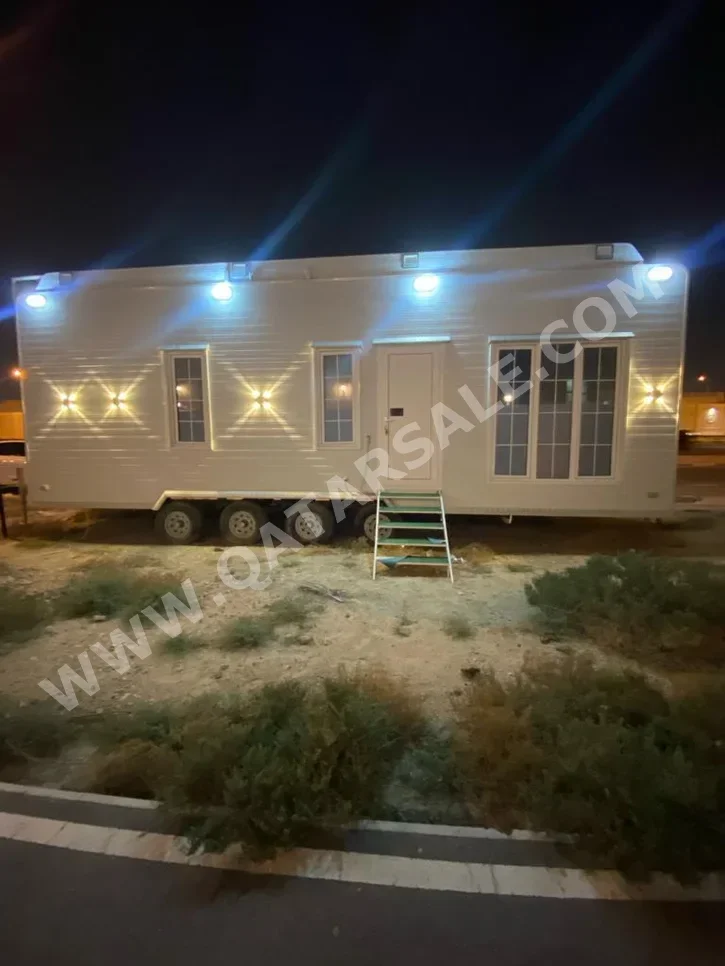 Caravan - 2022  - White  -Made in Qatar