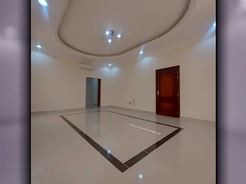 2 Bedrooms  Apartment  For Rent  in Umm Salal -  Umm Salal Ali  Not Furnished