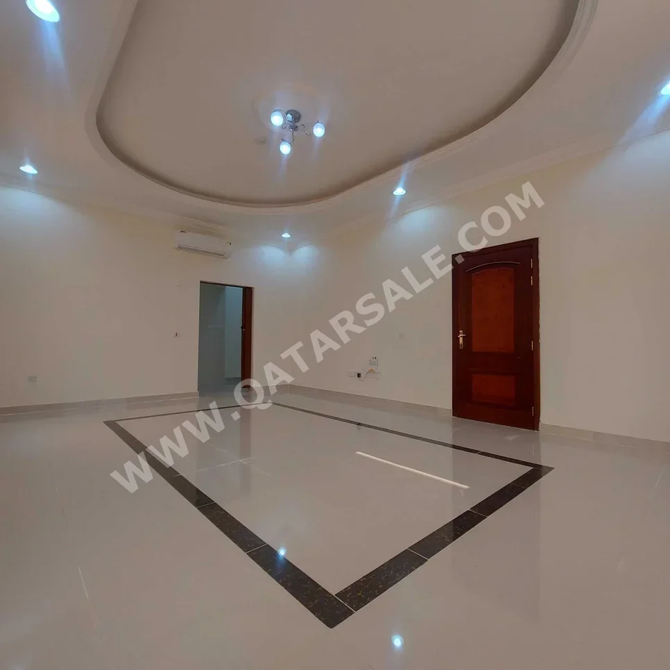 2 Bedrooms  Apartment  For Rent  in Umm Salal -  Umm Salal Ali  Not Furnished