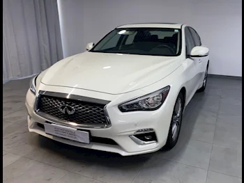 Infiniti  Q  50  2024  Automatic  13,200 Km  6 Cylinder  Rear Wheel Drive (RWD)  Sedan  White  With Warranty