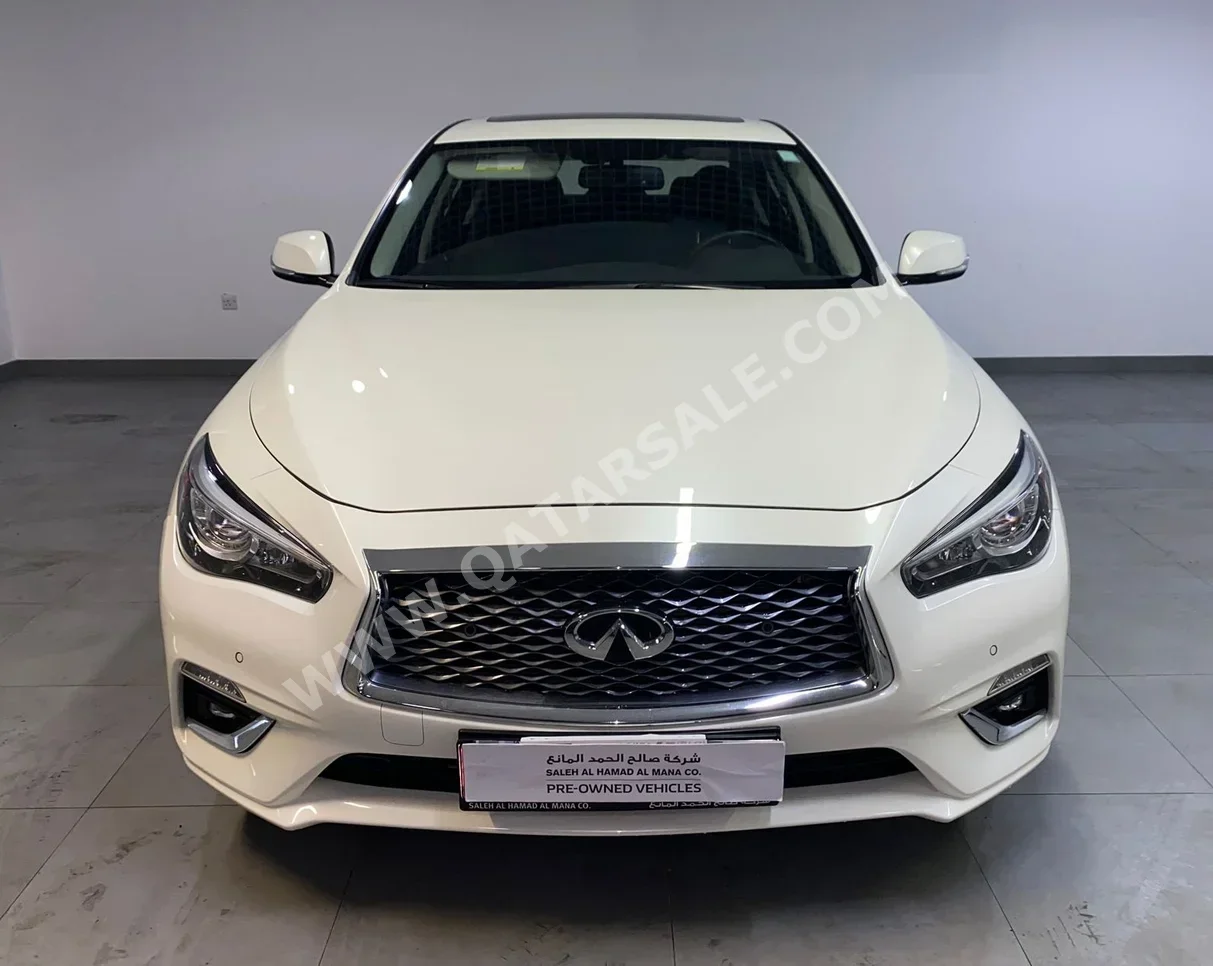 Infiniti  Q  50  2024  Automatic  13,200 Km  6 Cylinder  Rear Wheel Drive (RWD)  Sedan  White  With Warranty