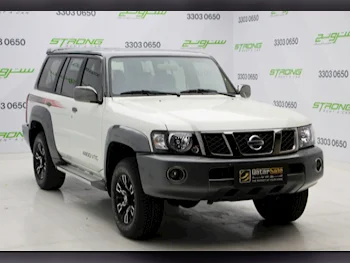  Nissan  Patrol  Super Safari  2023  Manual  11,000 Km  6 Cylinder  Four Wheel Drive (4WD)  SUV  Pearl  With Warranty