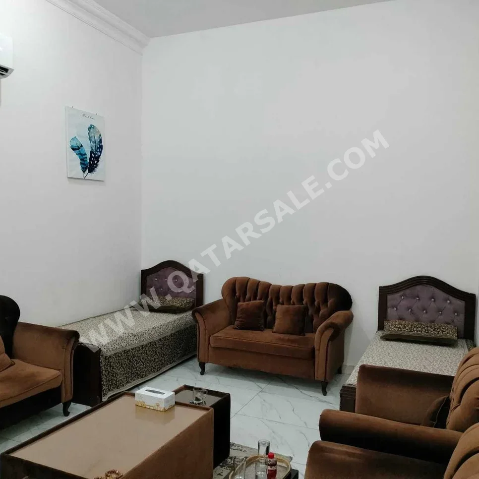 3 Bedrooms  Apartment  For Rent  in Umm Salal -  Al Kharaitiyat  Not Furnished