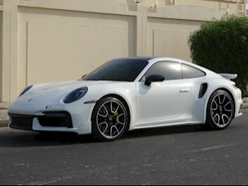 Porsche  911  Turbo S  2021  Automatic  11,700 Km  6 Cylinder  Rear Wheel Drive (RWD)  Coupe / Sport  White  With Warranty