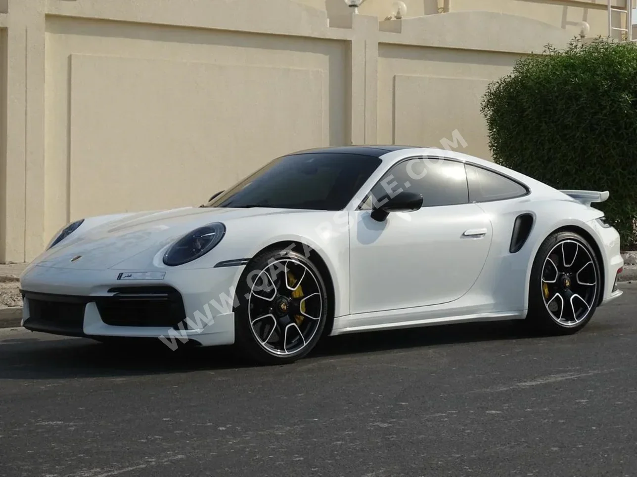 Porsche  911  Turbo S  2021  Automatic  11,700 Km  6 Cylinder  Rear Wheel Drive (RWD)  Coupe / Sport  White  With Warranty