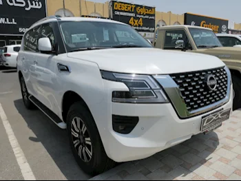 Nissan  Patrol  SE  2024  Automatic  0 Km  6 Cylinder  Four Wheel Drive (4WD)  SUV  White  With Warranty