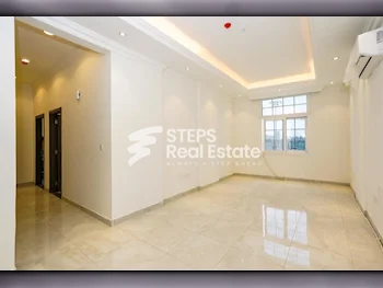 2 Bedrooms  Apartment  For Rent  in Doha -  Al Hilal  Not Furnished