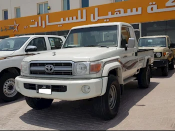 Toyota  Land Cruiser  LX  2009  Manual  184,000 Km  6 Cylinder  Four Wheel Drive (4WD)  Pick Up  White