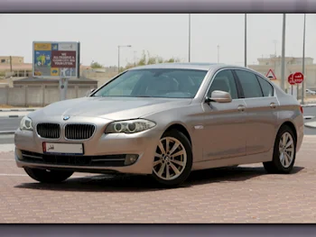 BMW  5-Series  520i  2014  Automatic  121,000 Km  4 Cylinder  Rear Wheel Drive (RWD)  Sedan  Gold