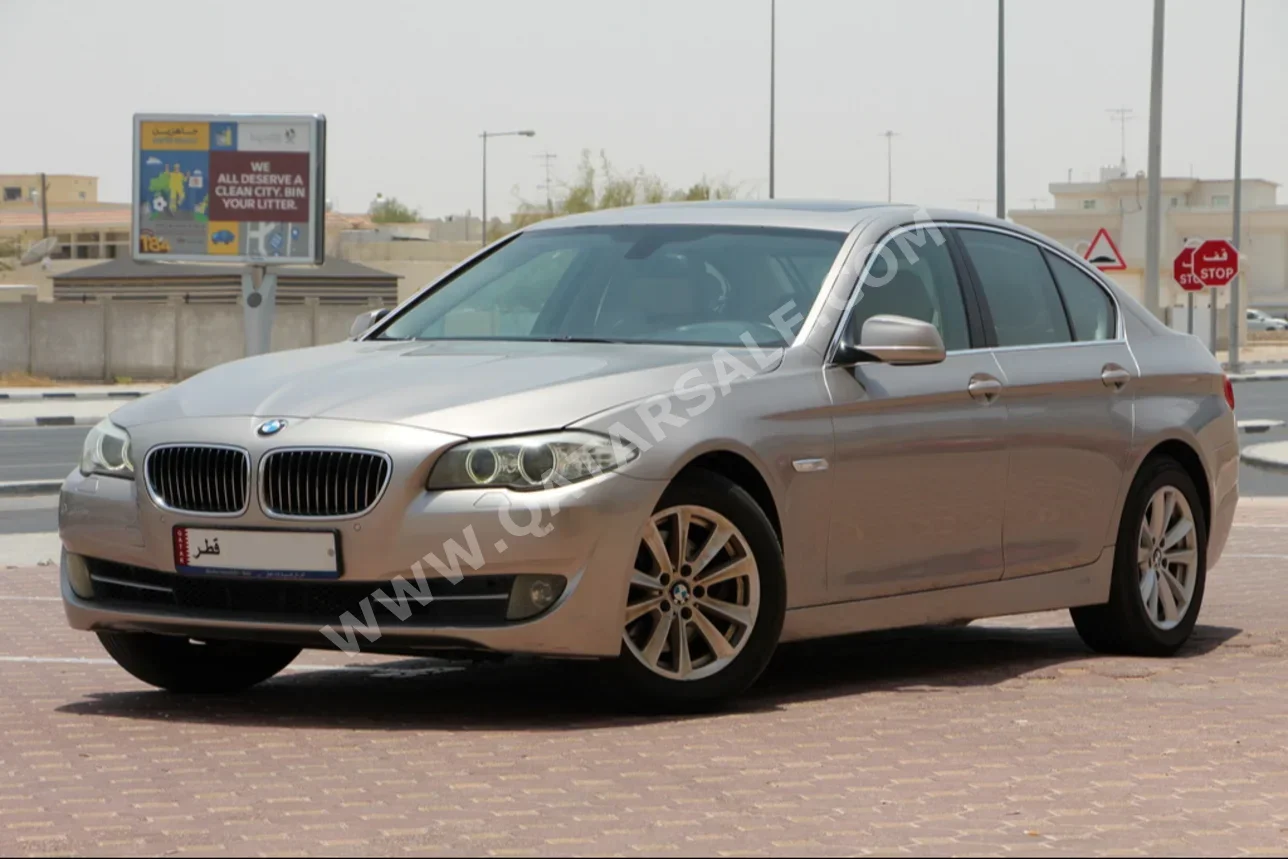 BMW  5-Series  520i  2014  Automatic  121,000 Km  4 Cylinder  Rear Wheel Drive (RWD)  Sedan  Gold