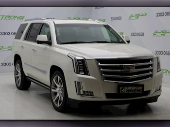  Cadillac  Escalade  Platinum  2015  Automatic  78,000 Km  8 Cylinder  Four Wheel Drive (4WD)  SUV  Beige  With Warranty