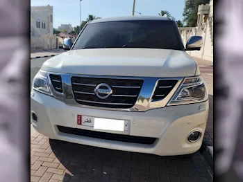 Nissan  Patrol  Platinum  2015  Automatic  156,000 Km  8 Cylinder  Four Wheel Drive (4WD)  SUV  White