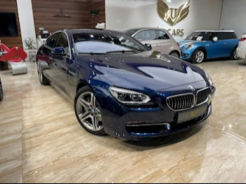 BMW  6-Series  640i Gran Coupe  2015  Automatic  99,000 Km  6 Cylinder  Rear Wheel Drive (RWD)  Sedan  Dark Blue