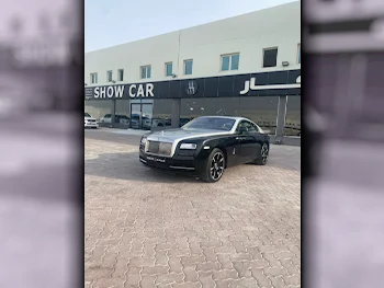 Rolls-Royce  Wraith  2015  Automatic  54٬000 Km  12 Cylinder  All Wheel Drive (AWD)  Coupe / Sport  Black and Silver