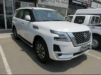 Nissan  Patrol  Titanium  2024  Automatic  0 Km  6 Cylinder  Four Wheel Drive (4WD)  SUV  White  With Warranty