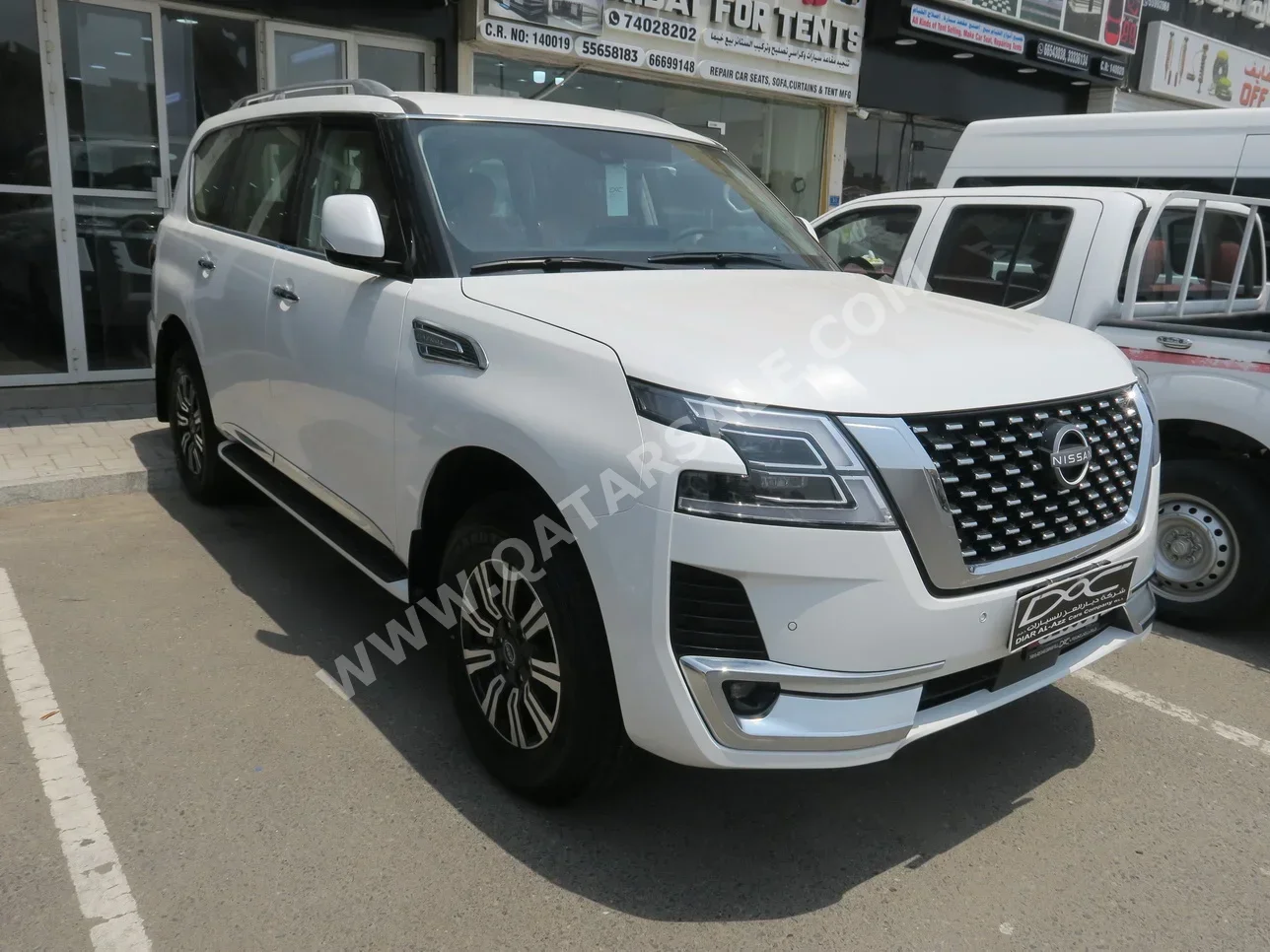 Nissan  Patrol  Titanium  2024  Automatic  0 Km  6 Cylinder  Four Wheel Drive (4WD)  SUV  White  With Warranty