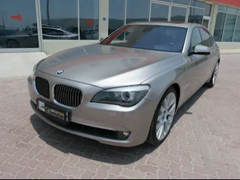 BMW  7-Series  750 Li  2011  Automatic  64,000 Km  8 Cylinder  Rear Wheel Drive (RWD)  Sedan  Gold