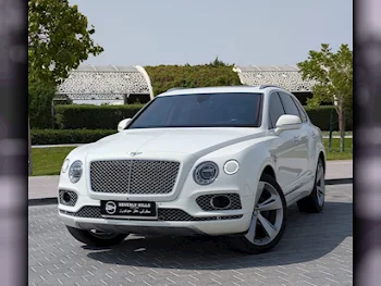 Bentley  Bentayga  2018  Automatic  137,217 Km  12 Cylinder  Four Wheel Drive (4WD)  SUV  White