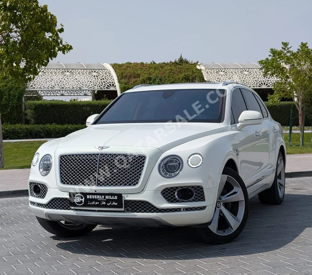 Bentley  Bentayga  2018  Automatic  137,217 Km  12 Cylinder  Four Wheel Drive (4WD)  SUV  White