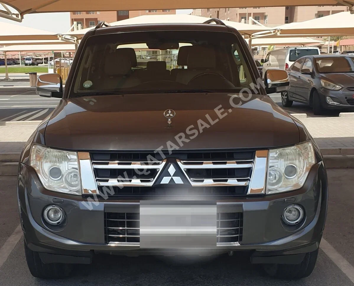 Mitsubishi  Pajero  3.8  2014  Automatic  243,000 Km  6 Cylinder  Four Wheel Drive (4WD)  SUV  Beige