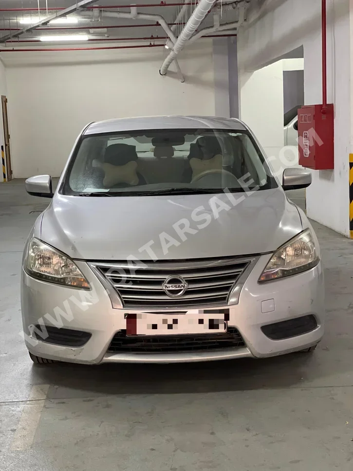 Nissan  Sentra  2013  Automatic  153,000 Km  4 Cylinder  Front Wheel Drive (FWD)  Classic  Silver