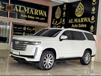 Cadillac  Escalade  Platinum  2021  Automatic  37,000 Km  8 Cylinder  Four Wheel Drive (4WD)  SUV  White  With Warranty