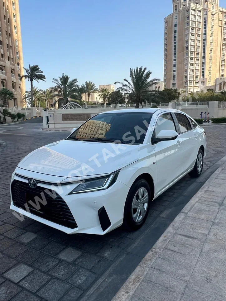 Toyota  Yaris  4 Cylinder  Sedan  Pearl  2024