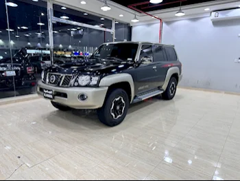 Nissan  Patrol  Super Safari  2021  Manual  25,000 Km  6 Cylinder  Four Wheel Drive (4WD)  SUV  Black and Beige