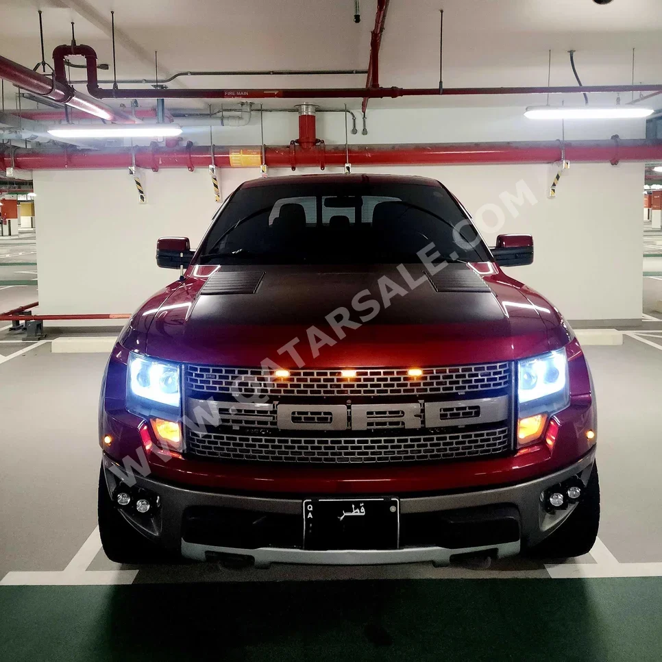 Ford  Raptor  SVT  2014  Automatic  174,000 Km  8 Cylinder  Four Wheel Drive (4WD)  Pick Up  Maroon  With Warranty