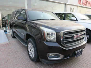 GMC  Yukon  SLE  2015  Automatic  112,000 Km  8 Cylinder  Rear Wheel Drive (RWD)  SUV  Purple