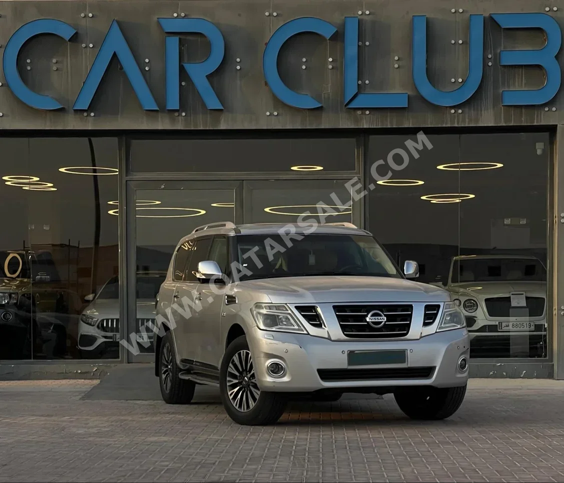 Nissan  Patrol  Platinum  2014  Automatic  281٬000 Km  8 Cylinder  Four Wheel Drive (4WD)  SUV  Silver