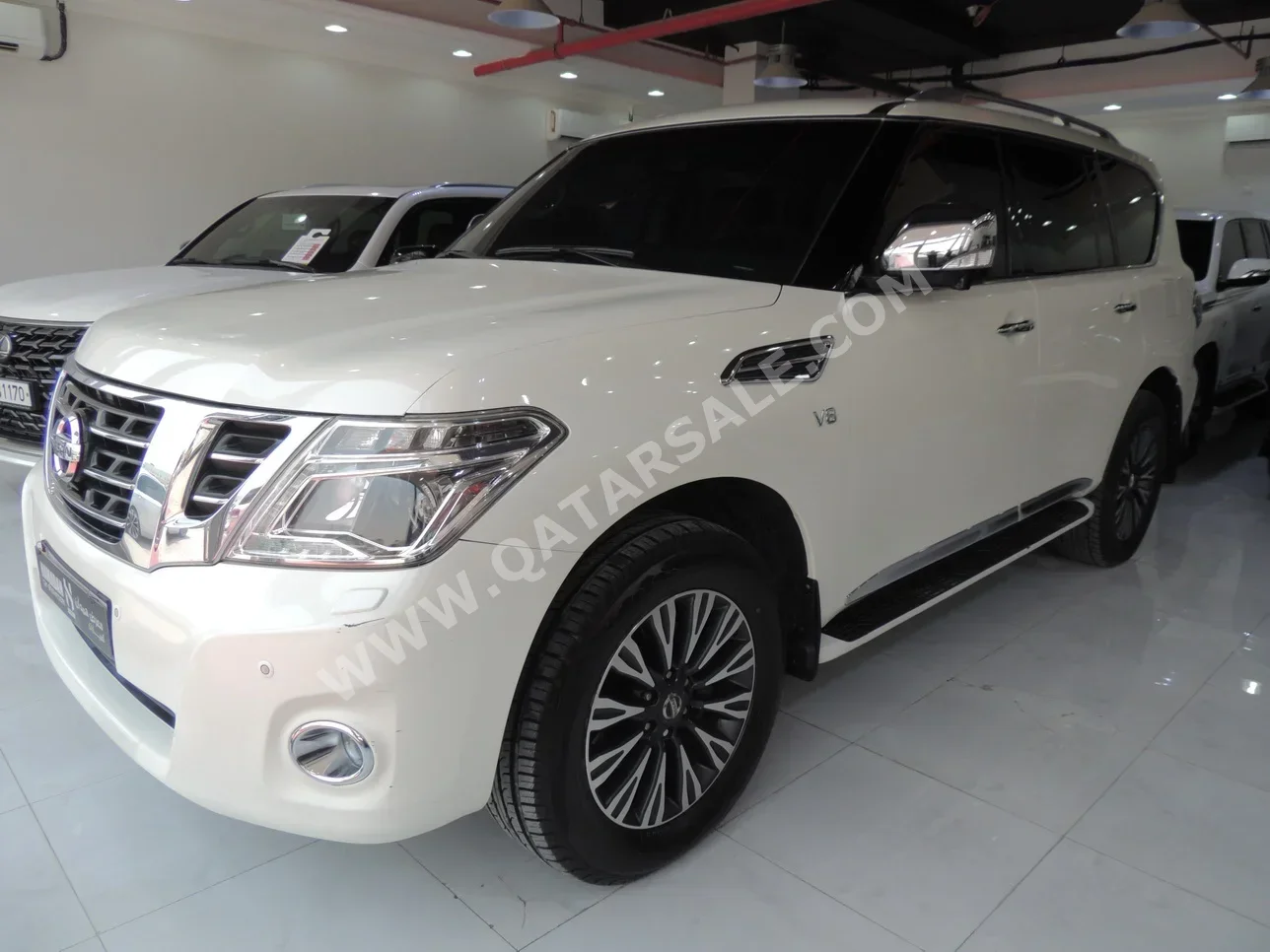 Nissan  Patrol  Platinum  2015  Automatic  246,000 Km  8 Cylinder  Four Wheel Drive (4WD)  SUV  White