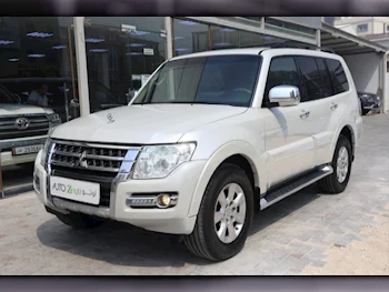 Mitsubishi  Pajero  GLS  2015  Automatic  203,300 Km  6 Cylinder  Four Wheel Drive (4WD)  SUV  White